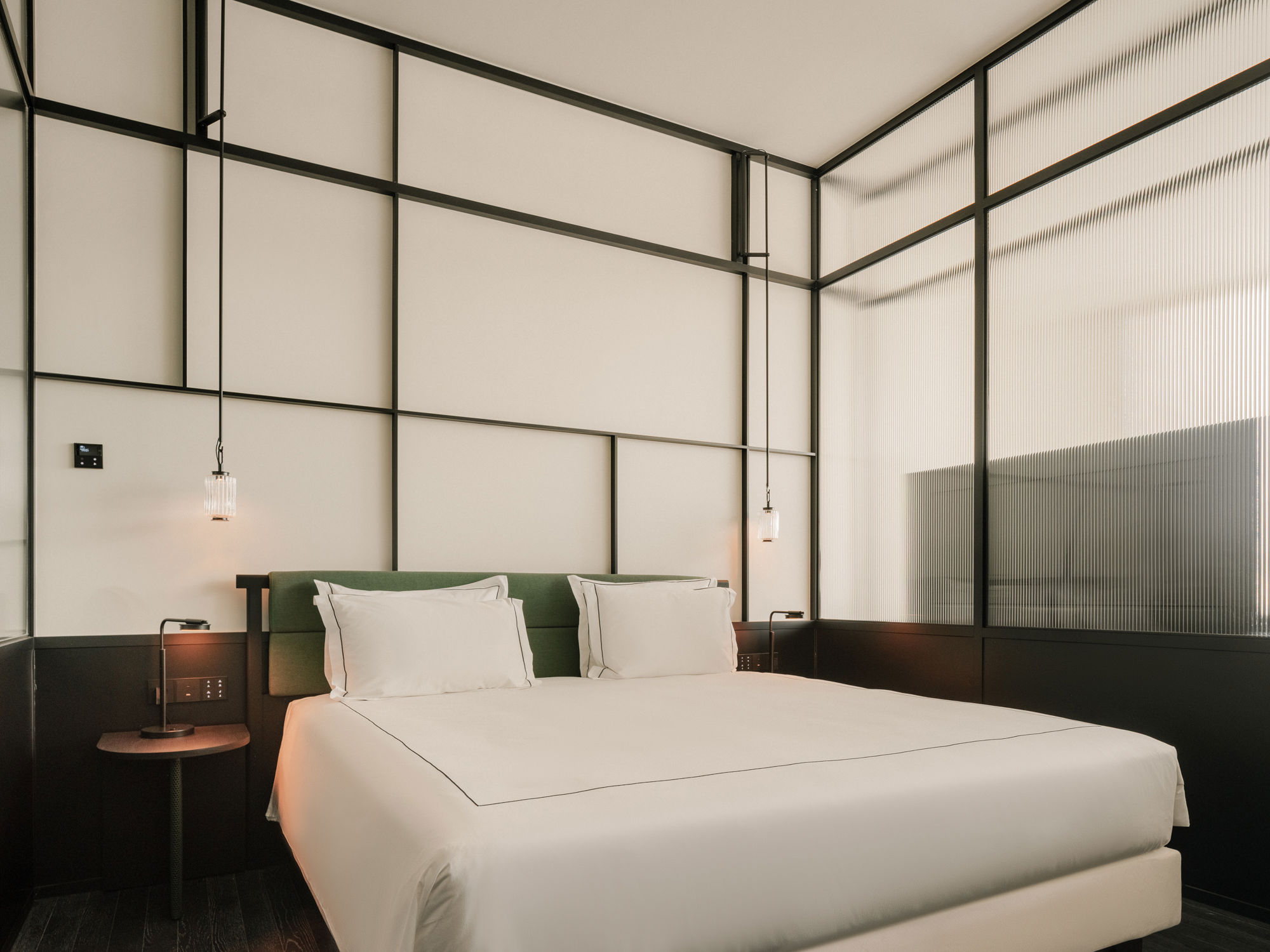 Flawlessly made hotel bed in a 5-star Junior Club Suite.