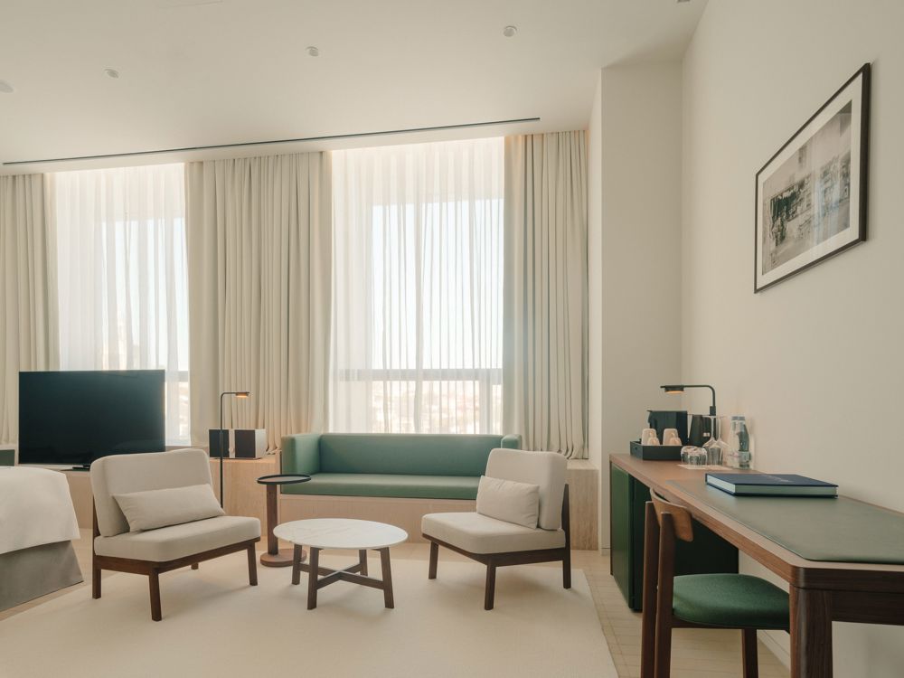 Tech-ready hotel room with easily accessible USB ports and smart controls.